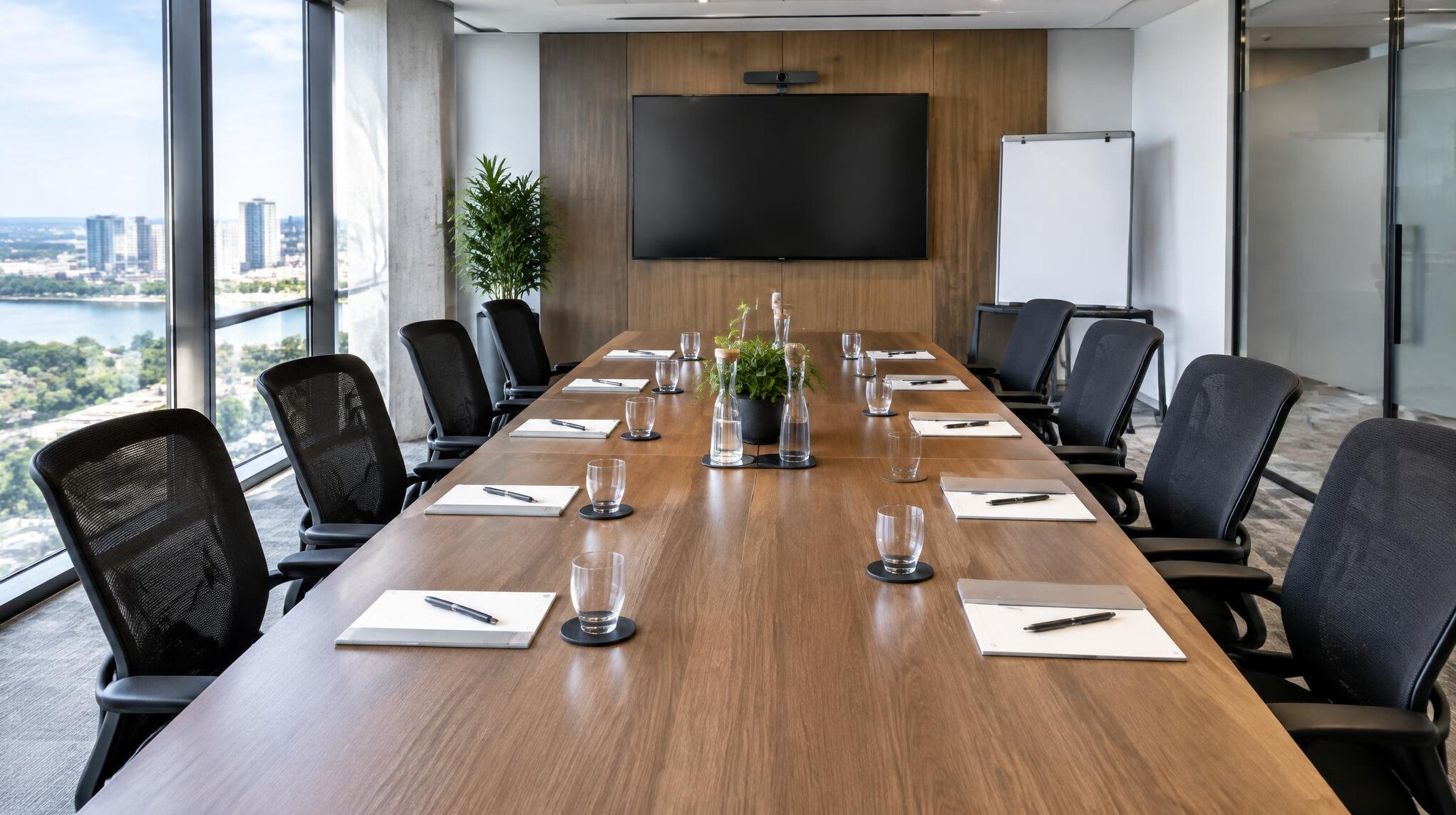 Modern conference room with wooden table prepared for a corporate resilience workshop